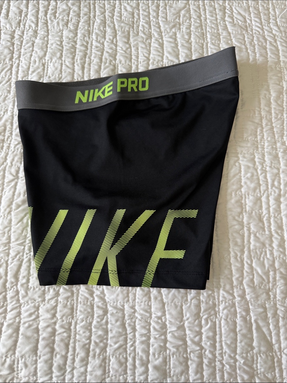 Nike Black Athletic Shorts with Neon Green Logo